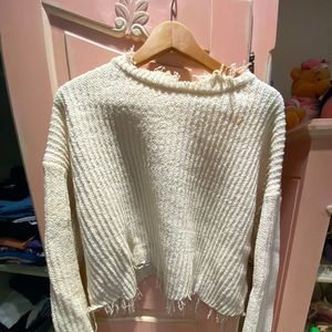 Cute white sweater perfect for fall/winter! Keeps you very warm.